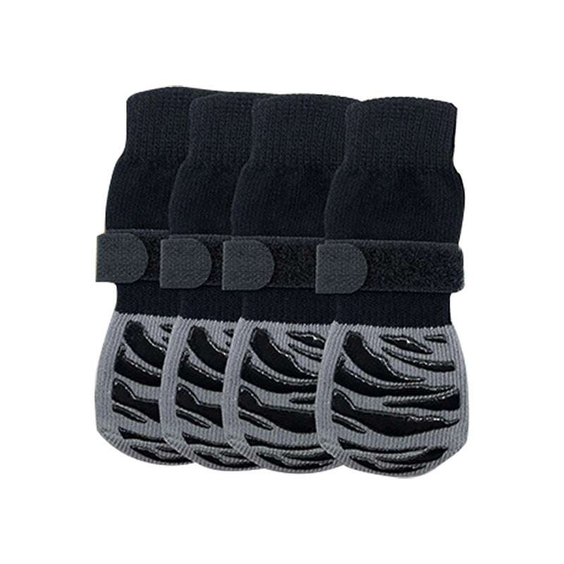 Four black dog non-slip socks with paw prints